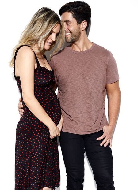 Josh Peck beside his wife Paige O'Brien annoucing their pregnancy.